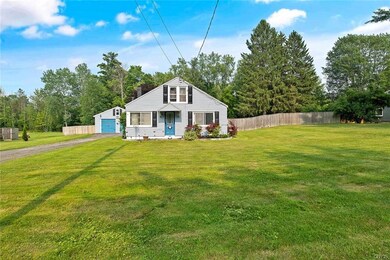 Front view showing more of property.