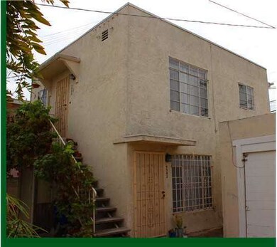 Duplex is located in the rear behind the two house