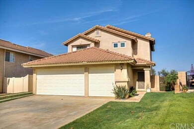 Three car garage and tile roof.