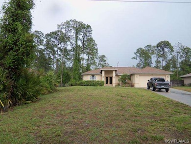 long, paved driveway