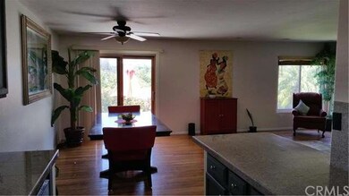 Dining area and adjacent living room/slider to bac