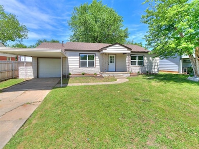 Classic mid-century charm with fresh updates and a large front yard.