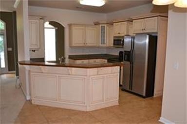 The Kitchen features custom cabinetry.  There is a