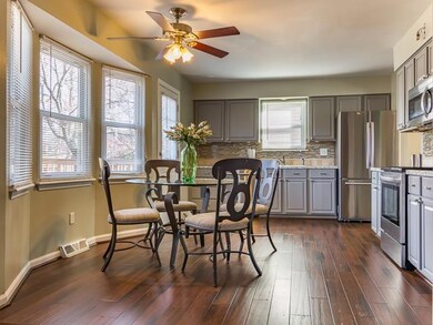 This kitchen has fabulous hardwood floors and has 