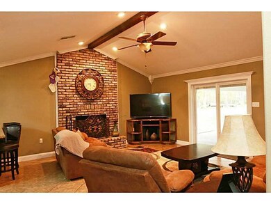 Living Room. Living room w/ vaulted ceilings & woo