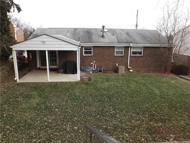20x15 Covered Rear Patio with Storage in ceiling.