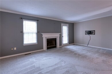 With access to the back deck, this living room als