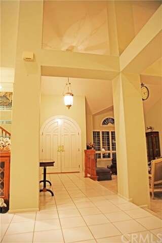Formal Custom Domed Double Door Entry leads into y