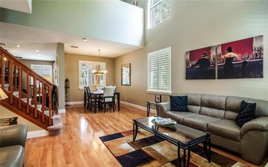 Entering the home, you'll find dramatic high ceili