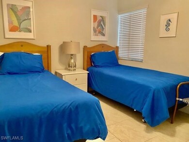 Bedroom with light tile patterned floors