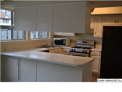 VIEW OF KITCHEN FROM BREAKFAST AREA