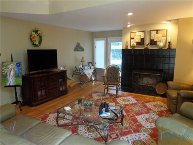 Great Room far left corner is door to a deck. Noti