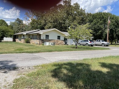 The home is located on the corner of Hwy 53 and Gentry Rd directly across from Coffee County Middle School. It has commercial possibilities if desired by the buyer.