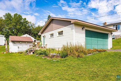 Garage with a lawn