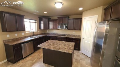 kitchen with island and pantry