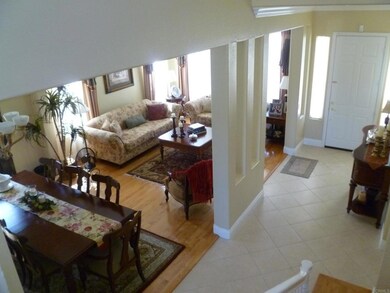 Entry has formal living room and dining area