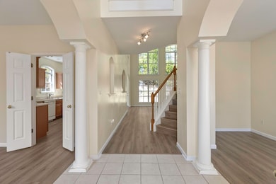 Open foyer with dining room on the left and office