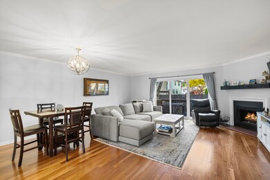 Open concept dining and family room with wood burning fireplace
