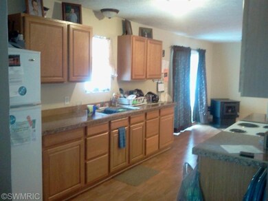 1445 W Charles Rd, Ionia, MI 48846 - photo 3