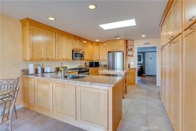 Custom cabinetry, lots of storage & natural light