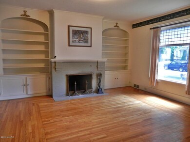 Wood burning fireplace with built-ins