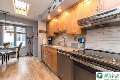 Updated kitchen with LVP flooring, quartz countert