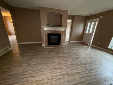 Unfurnished living room with light hardwood / wood