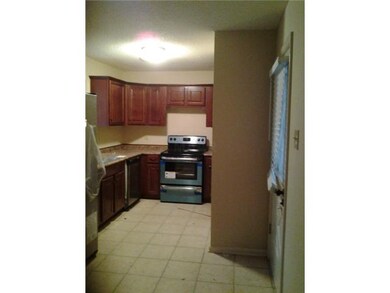 Updated kitchen features eleagant cabinets and bra