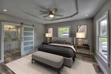 First floor master with Tray ceiling, tons of natu