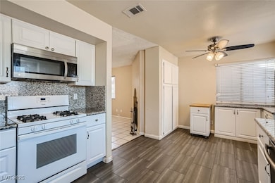 Kitchen featuring gas range gas stove, stainless s
