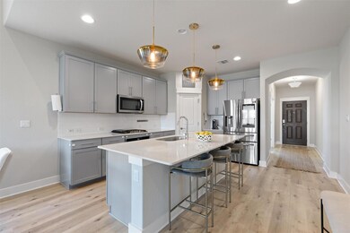 Kitchen featuring appliances with stainless steel
