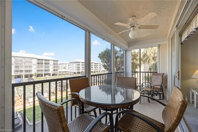 Screened lanai with marina views.