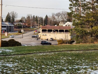 REAR YARD WITH THE NEIGHBORING VIEW OF HAROLDS RES