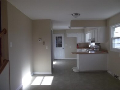 Pantry and a new smooth top Whirlpool range and li