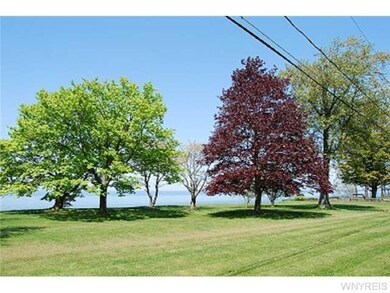 Exterior Front Beautiful Color from mature trees i