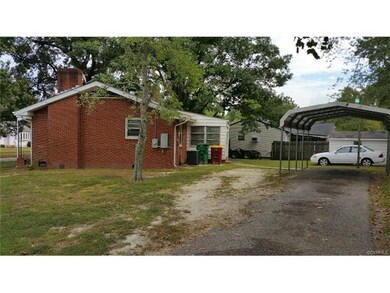 REAR DRIVEWAY AND CARPORT