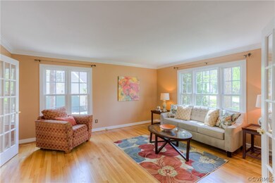 Living Room with newly finished hardwood and Frenc