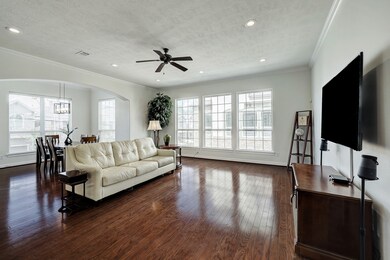 Living and formal dining are filled with natural l