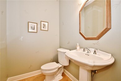 Convenient first floor powder room with soft paint