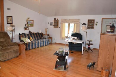 Spacious kitchen with breakfast bar, gas range. Lo