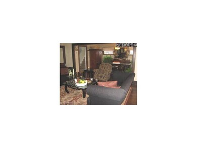 Living room opens to formal dining