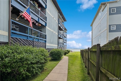 View of community featuring a water view