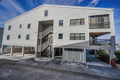 Directly across Gulf Blvd from the sugary sands of Indian Shores!