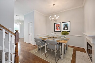 Dining room with fireplace. Virtually staged photo