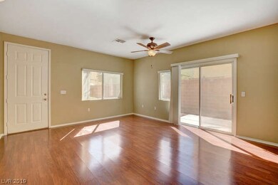 Living Room and Slider out to Backyard Patio.