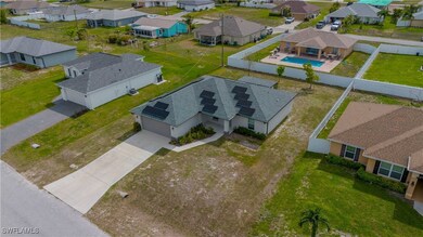 Aerial view of residential area with a pool