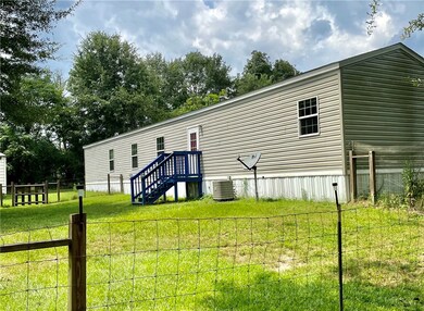 Backyard and front yards are fully fenced with 3 g