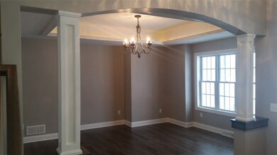 Dining room with trey backlit ceiling