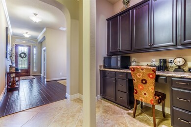 Office center right off of kitchen. Extra cabinets and counter space.