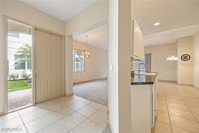 View of entry and kitchen